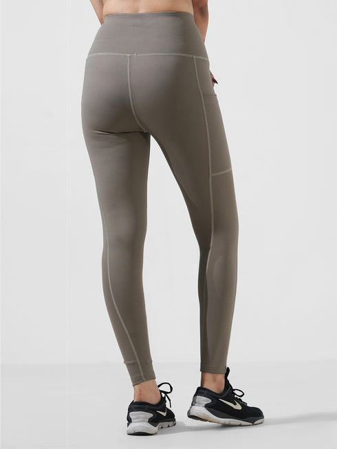 Dust Brown Motion Pocket Legging in Cloud Compression