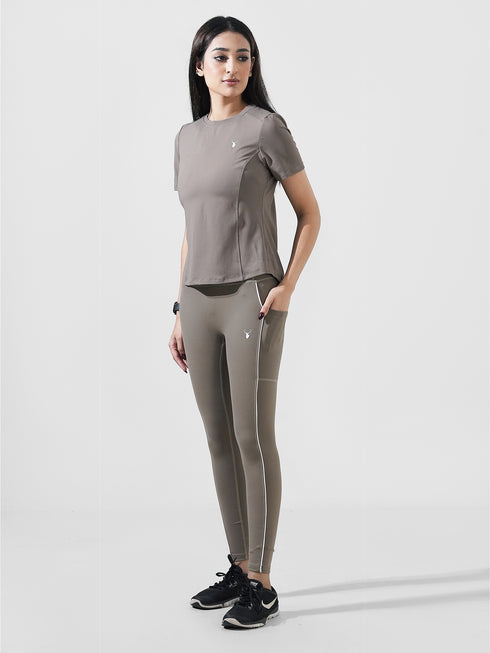 Leera Motion Pleat Performance Tee in Dust Brown