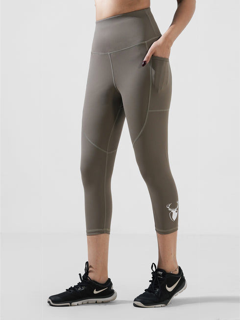 Traction Dust Brown Pocket Capri Legging in Cloud Compression