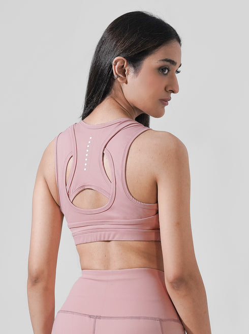Leera Contour Cutout Sports Bra in Tea Pink
