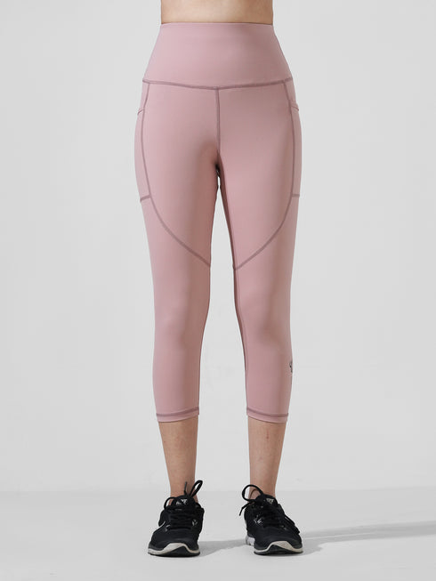 Traction Tea Pink Pocket Capri Legging in Cloud Compression