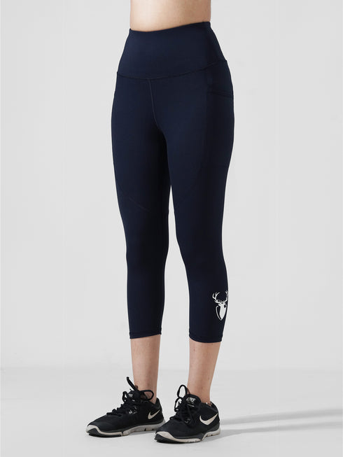 Traction Navy Pocket Capri Legging in Cloud Compression