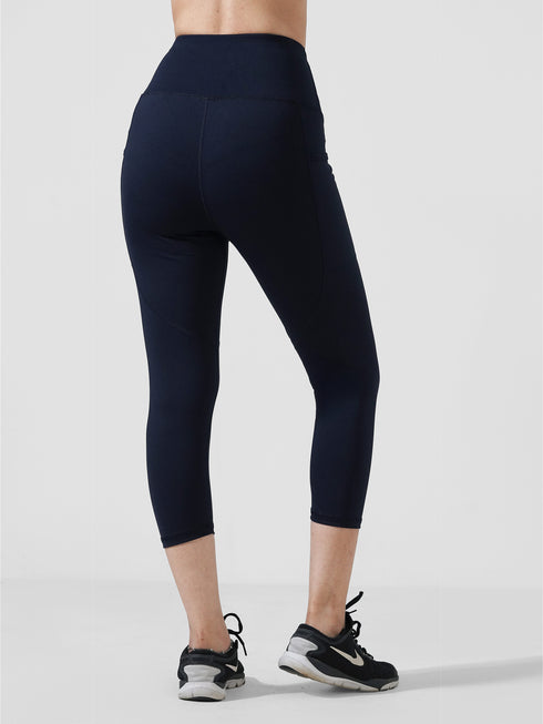 Traction Navy Pocket Capri Legging in Cloud Compression