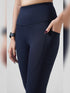 Traction Navy Pocket Capri Legging in Cloud Compression