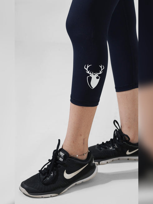 Traction Navy Pocket Capri Legging in Cloud Compression