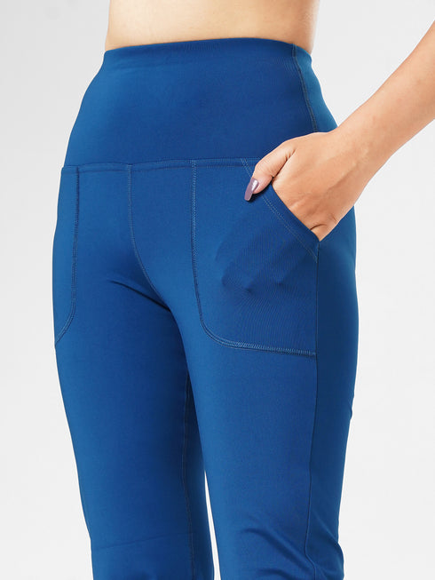 Proactive Pocket Flare legging in Teal Blue