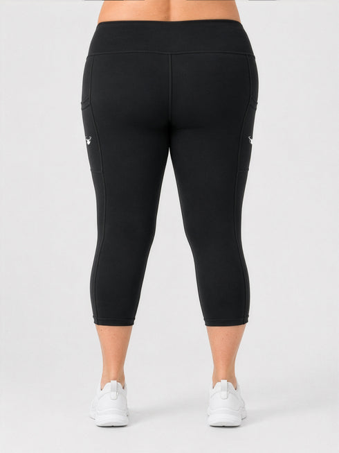 Leera black plus size capri pocket legging back view with capri length
