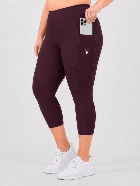 Leera maroon plus size capri pocket legging front view with side phone pocket