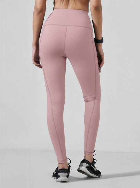 Tea Pink Motion Pocket Legging in Cloud Compression