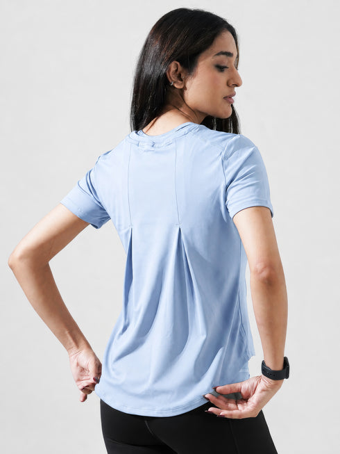 Leera Motion Pleat Performance Tee in Sky Blue