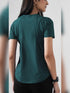 Leera Motion Pleat Performance Tee in Teal Green